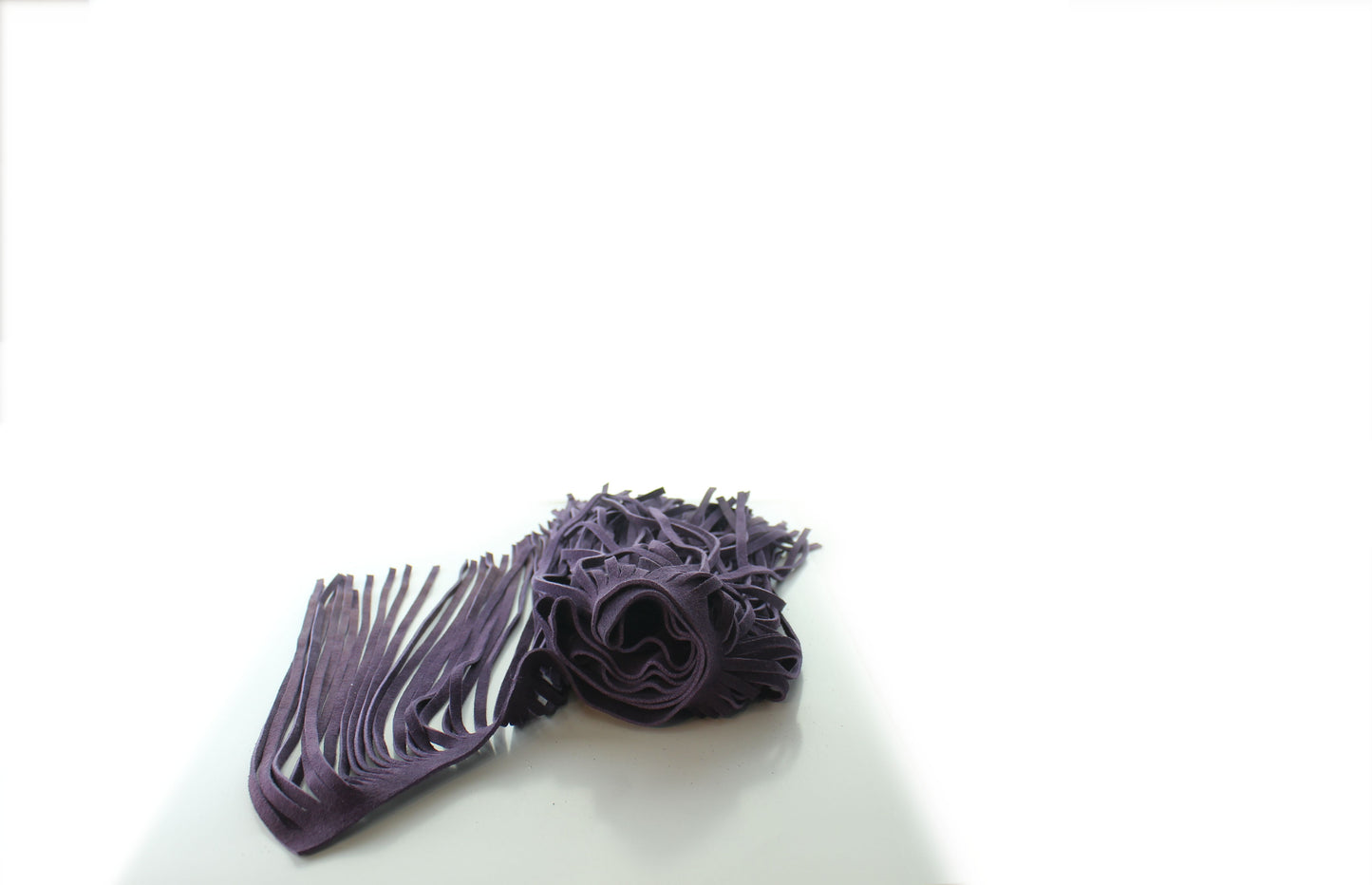 Fringe Dark purple, 10 inch length with 1/2 bias at the top. sold by the foot