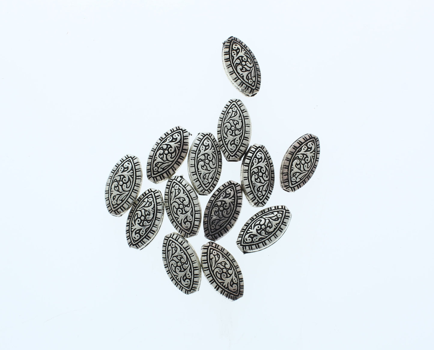 24mm x 13mm Antique Scroll Oval Beads, pack of 13