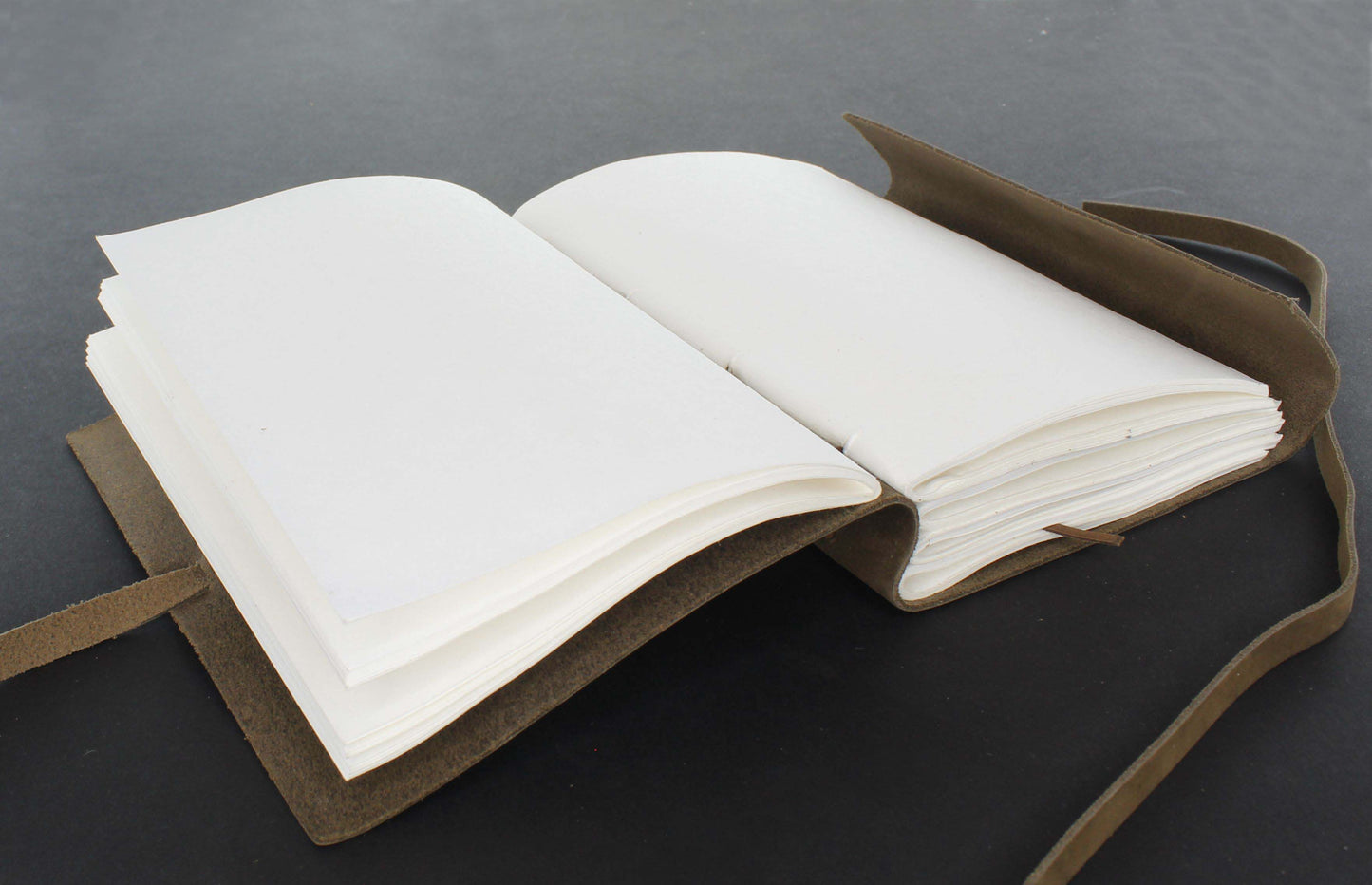 Tree of Life Embossed Leather Journal with String Closure, each