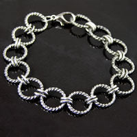 7.5in Antiqued Classic Silver Textured Round Ring Bracelet, w/lobster clasp ea
