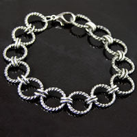 7.5in Antiqued Classic Silver Textured Round Ring Bracelet, w/lobster clasp  ea