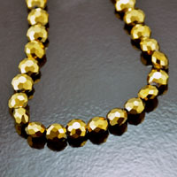 10mm Faceted Flat Round Fire-n-Ice Crystal®, Metallic Gold, strand