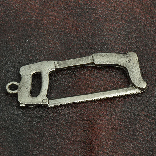 Hack saw Charm, with ring 38mm, zinc cast, sold by ea