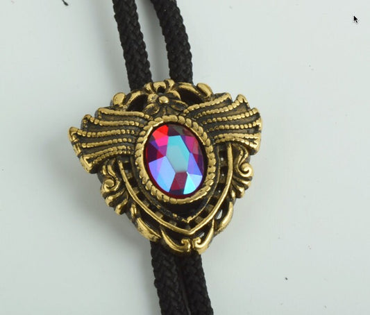 Winged Medallion Bolo Tie, ruby crystal stone in antique gold setting, 35" black cord with gold tips, each