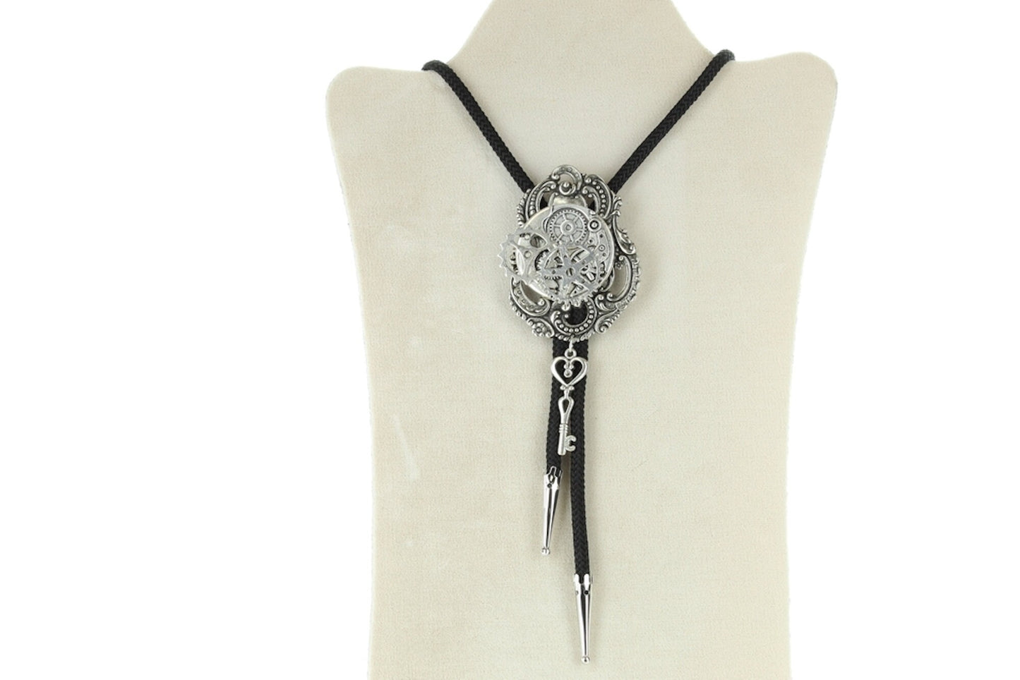 Key to TIme bolo , made in USA, silver plated, tips