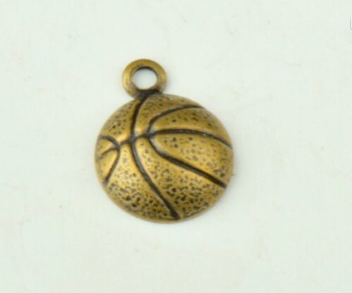 Basketball Charm one sided, brass plated, sold in packages of 6 15144