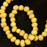 7x9mm Yellow Limestone Natural Rounds, 12in strand