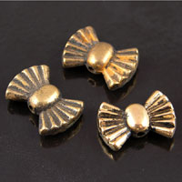 12x18mm Vintage Antiqued Gold Bow Shaped Beads, strand