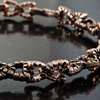 15x8x3mm Bow Shaped Antiqued Copper Beads 12in strand