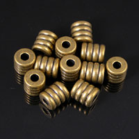 9x7.5mm Metal 4 Ring Barrel Beads, Sold by Dozen