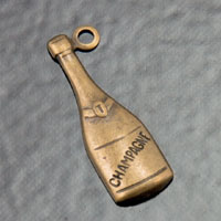 19x6mm(.75in) Antiqued Gold Champagne Bottle Charm, pack of 6