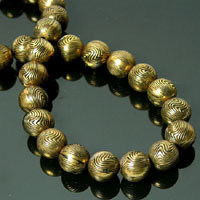 10mm Swirled Round Beads, Antique Gold, pack of 31