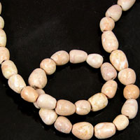 7x8mm Salmon Peach Rice Beads, dyed stone, 12 inch strand