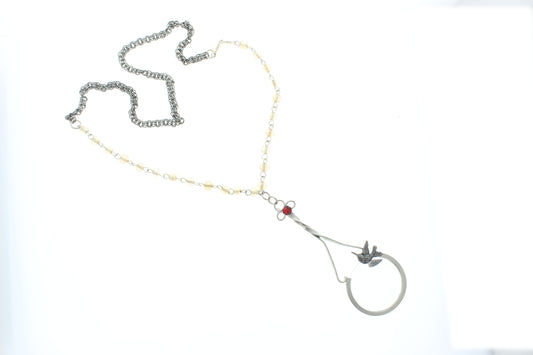 Flight of Focus – Handcrafted Monocle Necklace with Hummingbird Accent