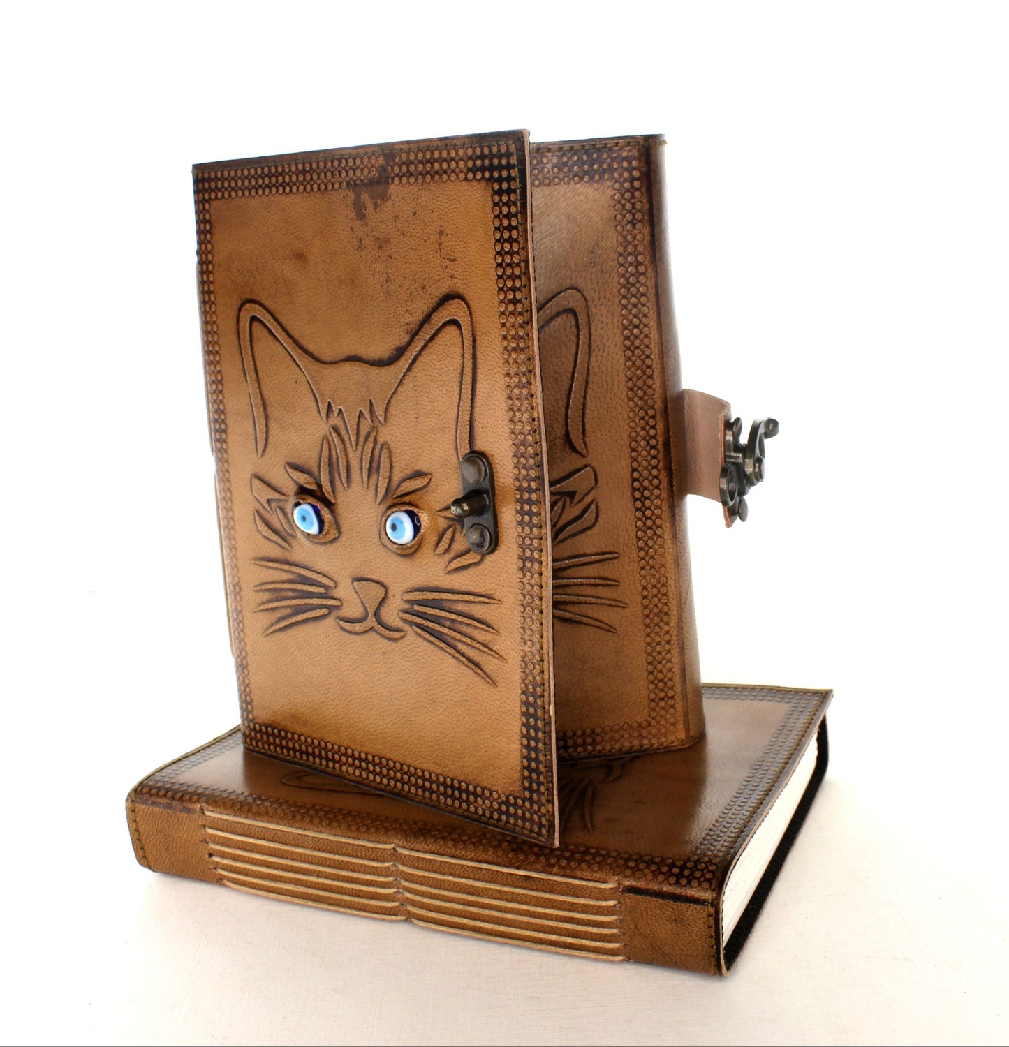 Cat Leather Journal with stone eyes and metal Closure, each