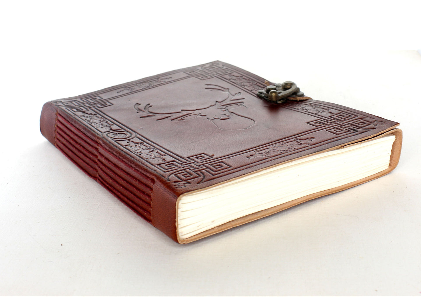 Swamp Deer Embossed Leather Journal Lock Closure, each