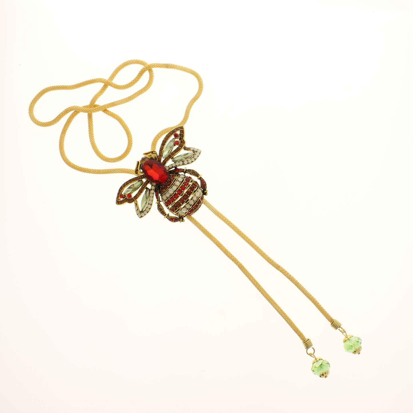 Jeweled bee bolo tie with ruby-red body, sparkling wings, and gold cord, handmade western jewelry from Texas.