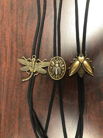 Flying Insect Bug Bolo Tie with matching tips, Antique Gold, 36" black, red or turquoise woven cord, made in USA, Each