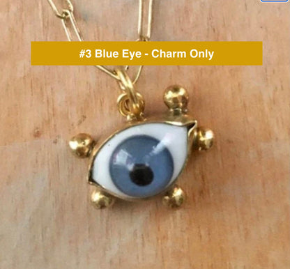 Glass Evil Eye Charm set in Gold, Handmade, Choose blue eye or brown eye, Each