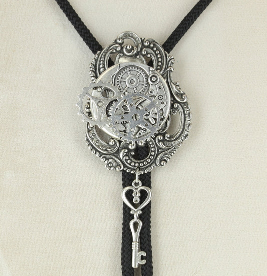 Key  to TIme bolo , made in USA, silver plated, tips