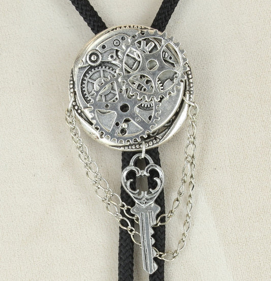 Key to TIme bolo , made in USA, silver plated, tips