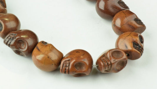 Skull beads, 14x18mm,  brown stone, pack of 25 beads