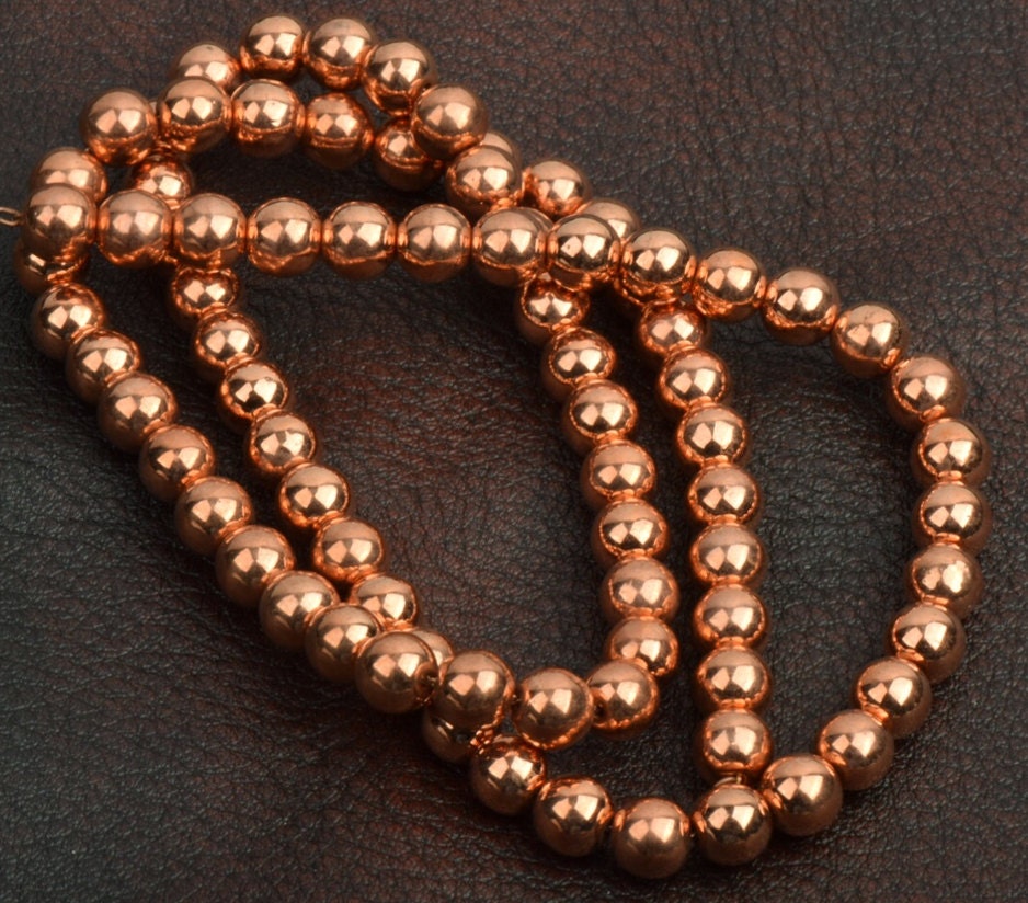 Copper Beads on a strand, graduated size, 30" strand